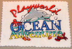Full-colour embroidered Ocean Adventure dolphin badge